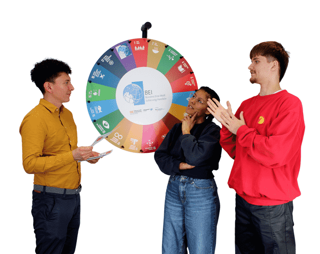 Drehbares SDG-Rad mit 3 Personen davor